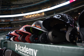 Baseball jerseys in a dugout